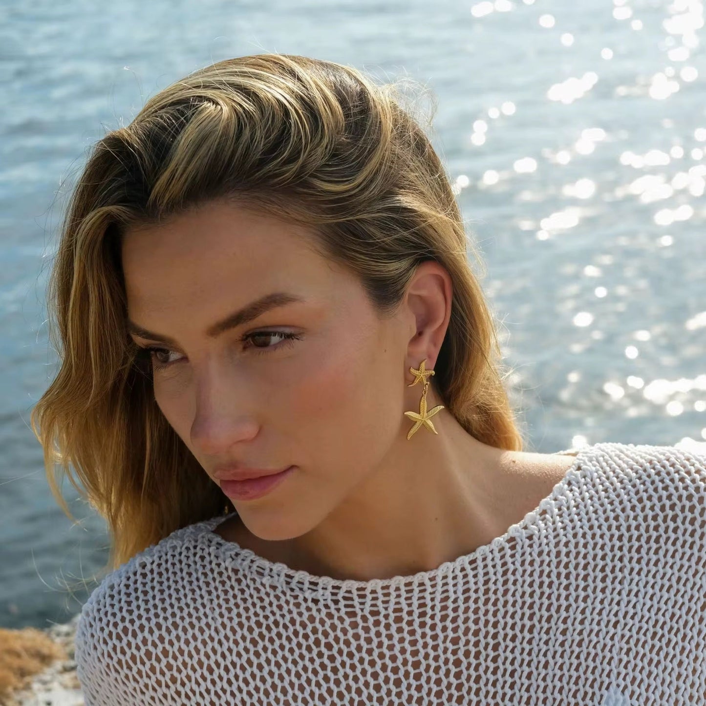Starfish earrings styled with summer outfit