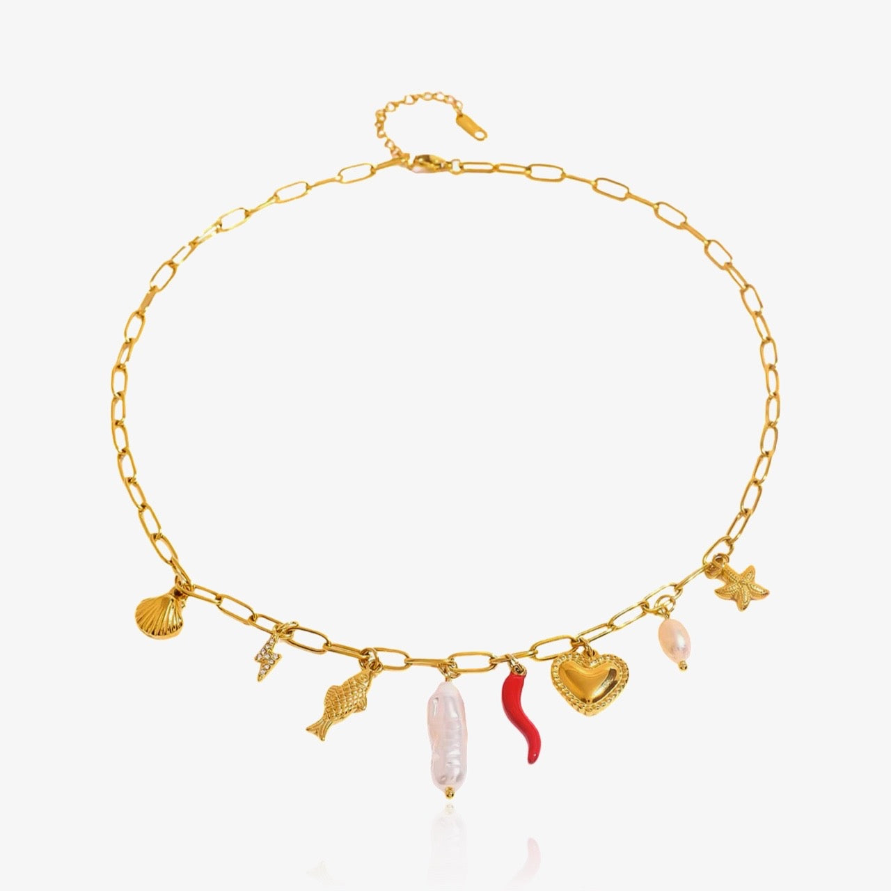 Statement necklace with playful charms and irregular pearls
