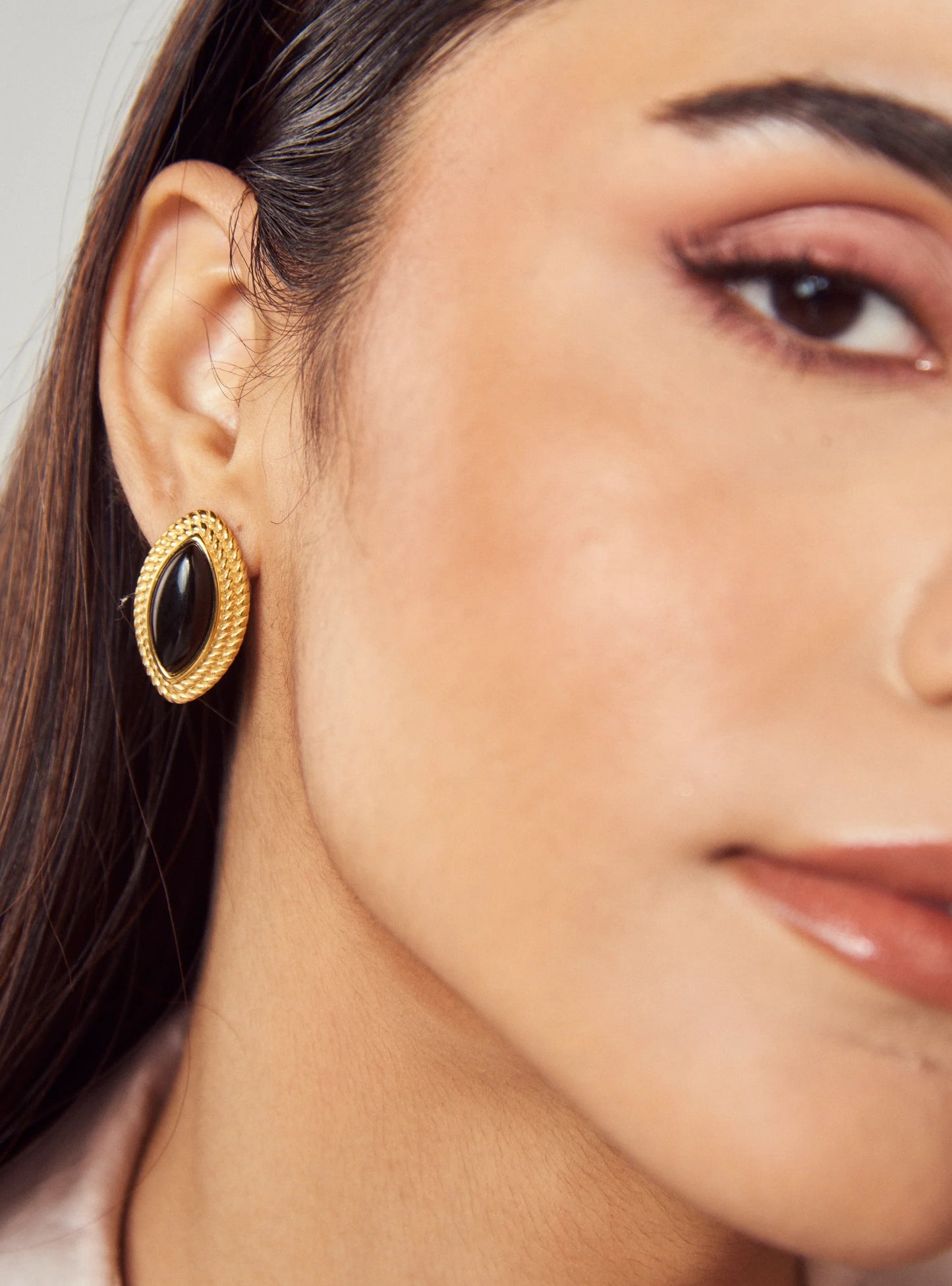 Model wearing Statement Boss Babe earrings