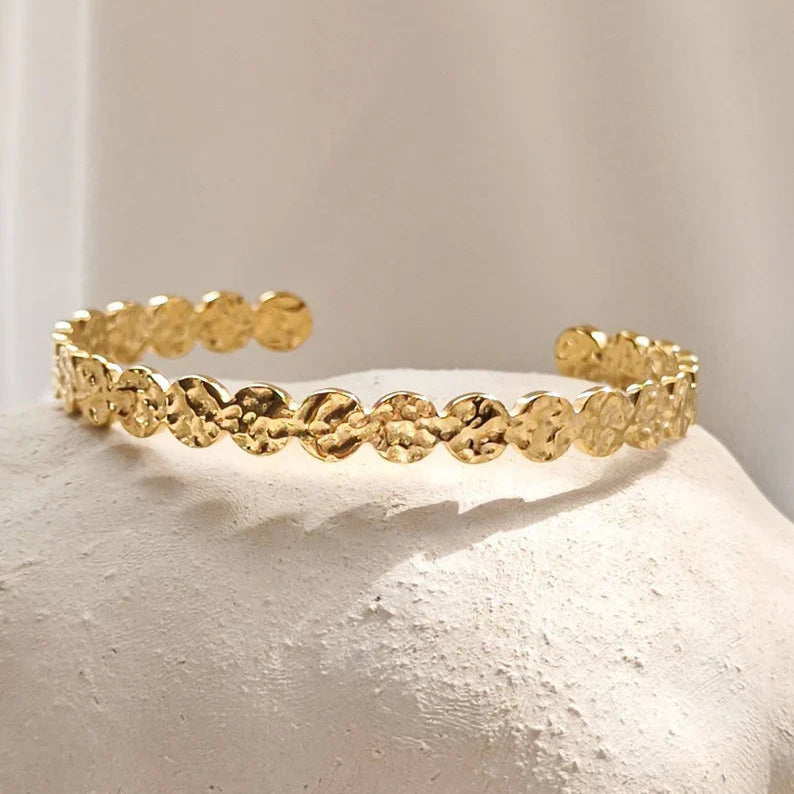 Textured organic bracelet styled on forearm