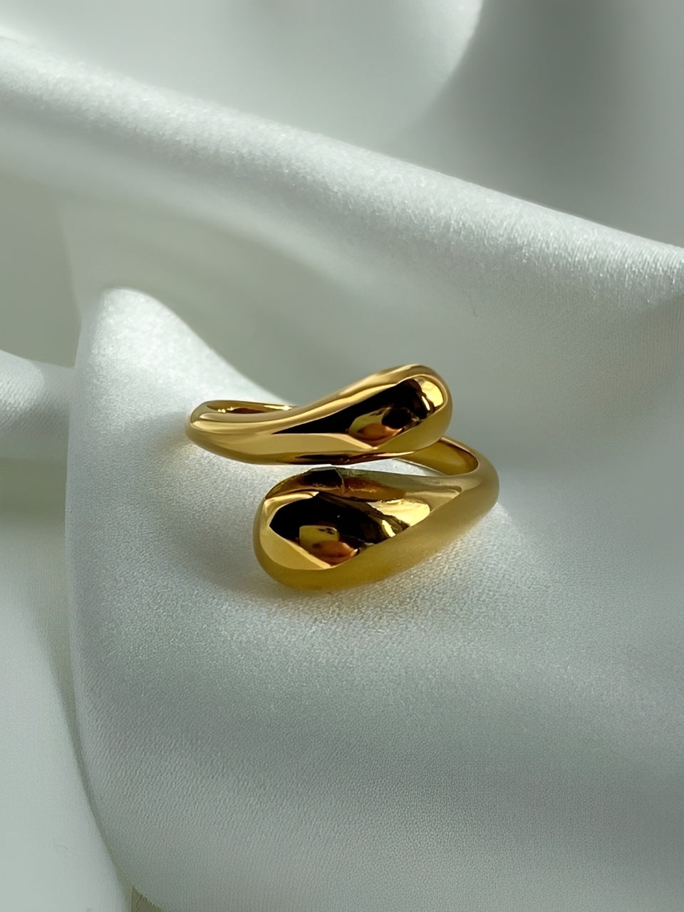 Double twist ring in elegant gift-ready packaging