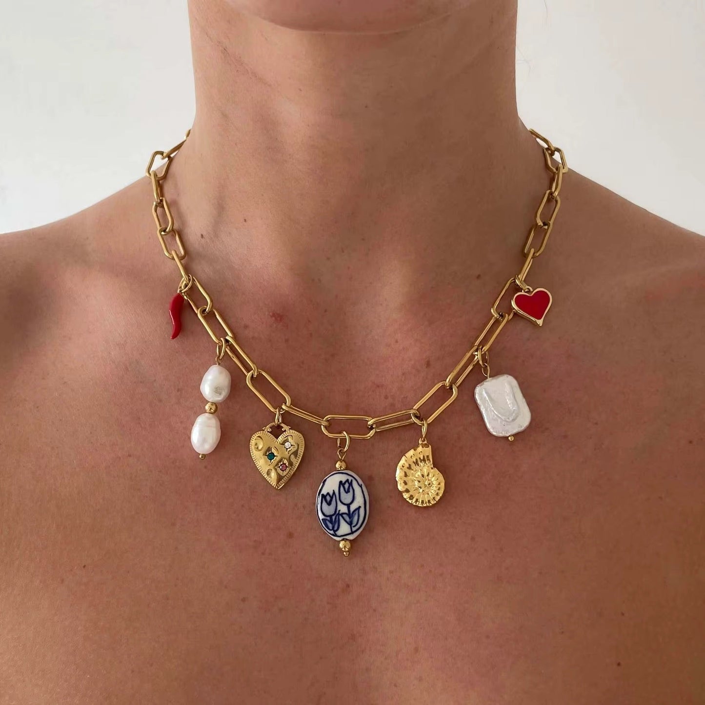Waterproof charm necklace with floral and heart details