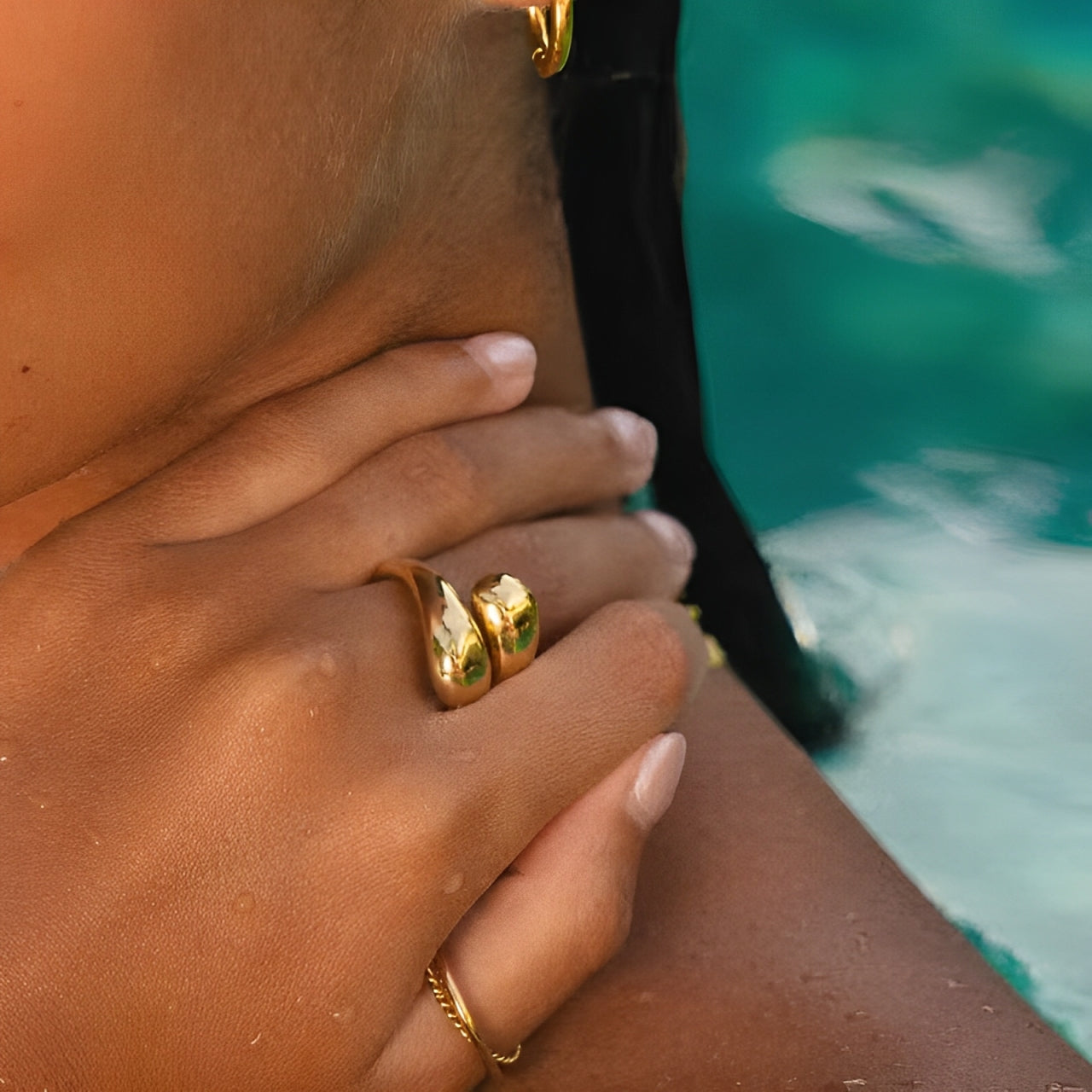 Close-up of waterproof double twist ring with smooth curves
