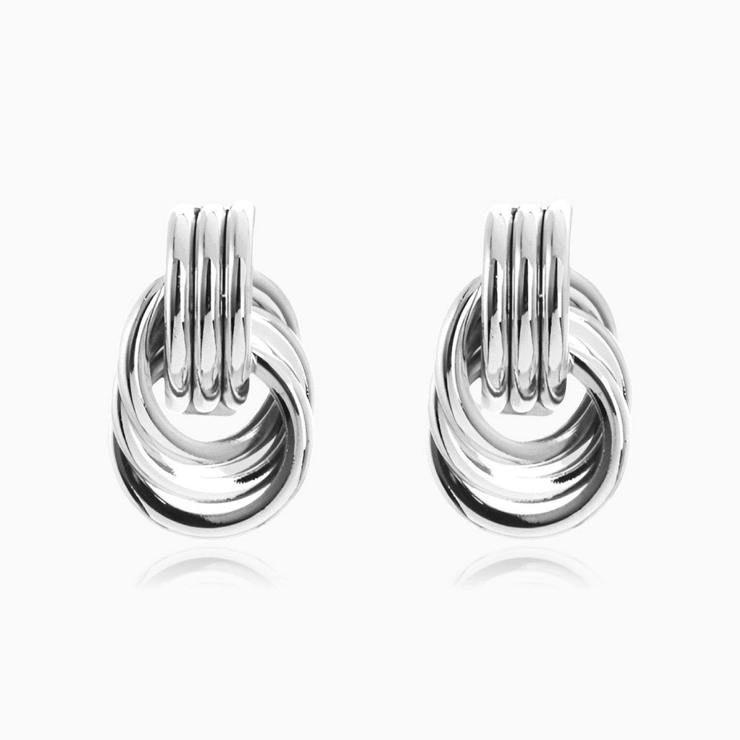 Waterproof test on gold and silver knot earrings