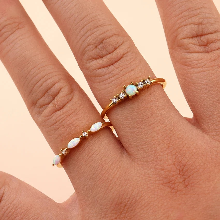 Close-up of waterproof opal ring with crystal detail