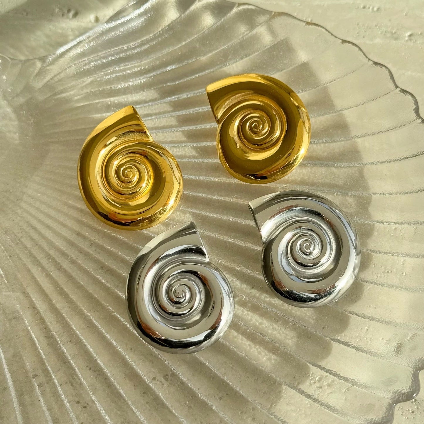 Detail of waterproof summer shell earrings