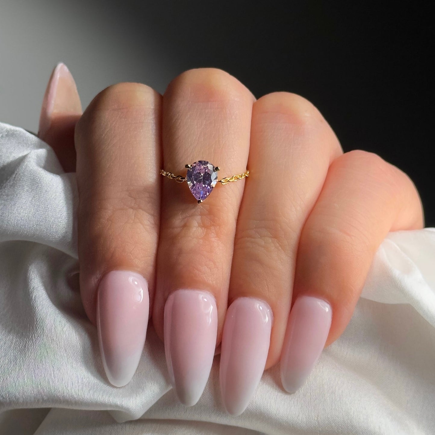 Adjustable chain ring with light amethyst drop in gold