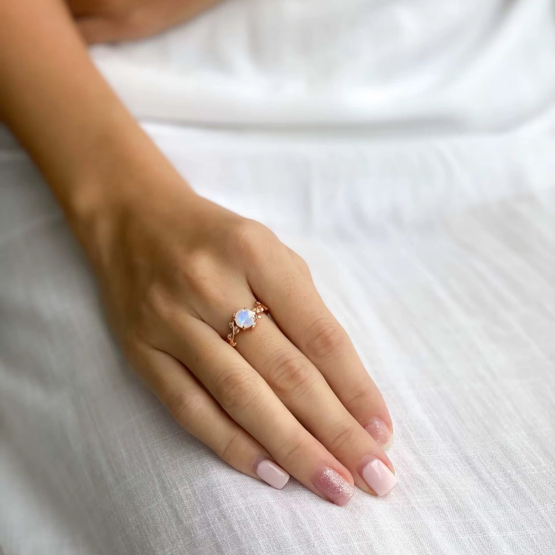 Open band design of adjustable moonstone ring
