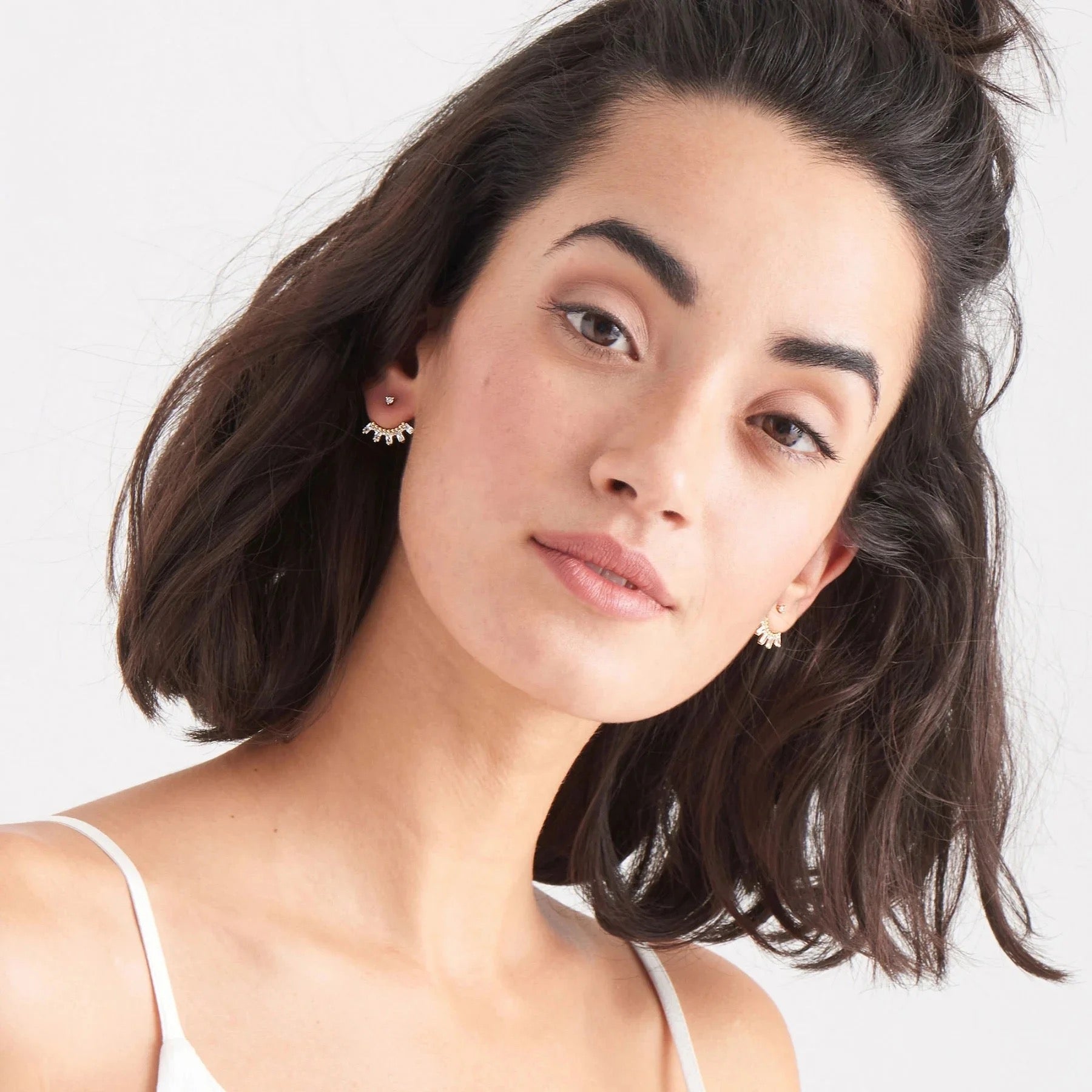 Celebration ear jacket earrings worn with elegant outfit