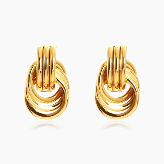 Front view of Clean Knot gold and silver geometric earrings