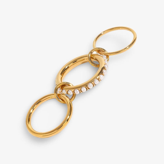 Front view of CONNECTION triple pearl fidget ring