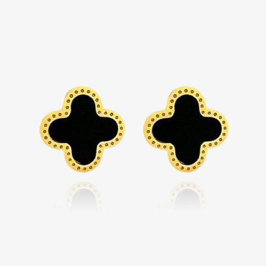 Front view of black clover stud earrings in gold and silver