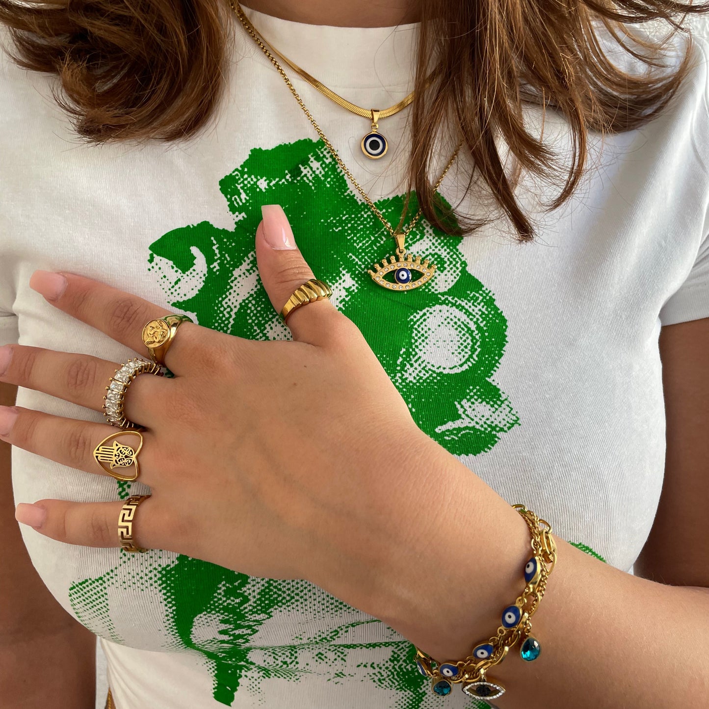 Evil Eye bracelet styled in layered jewelry look