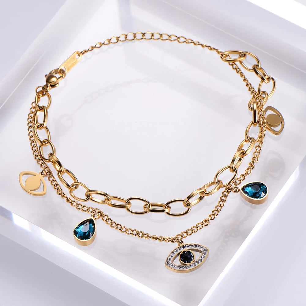 Evil Eye bracelet worn on wrist with layered look