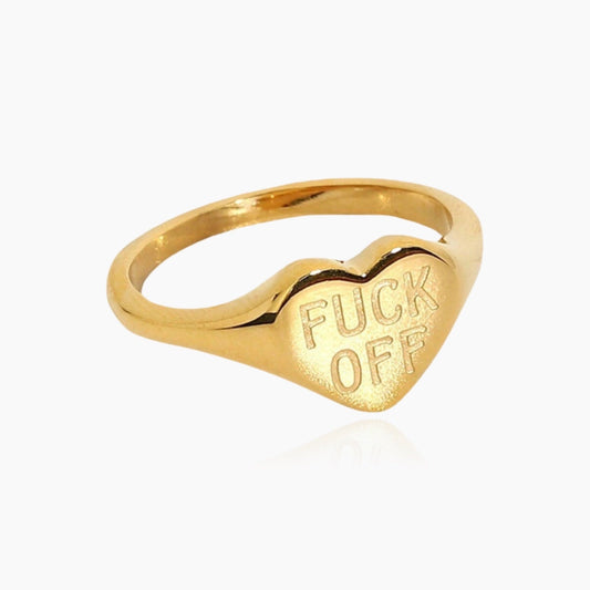 Front view of gold Fck Off ring on white background