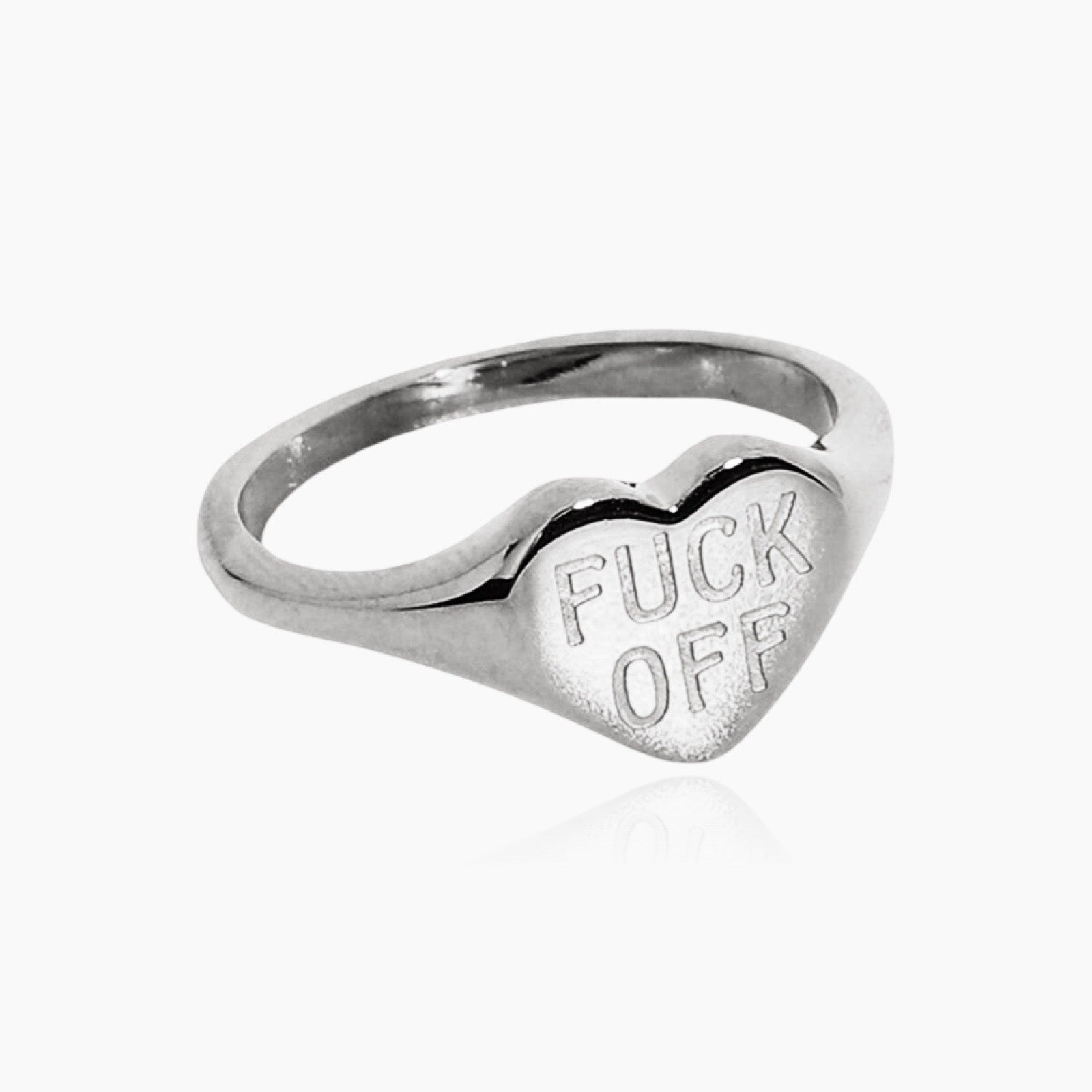 Fck Off ring styled with other bold rings