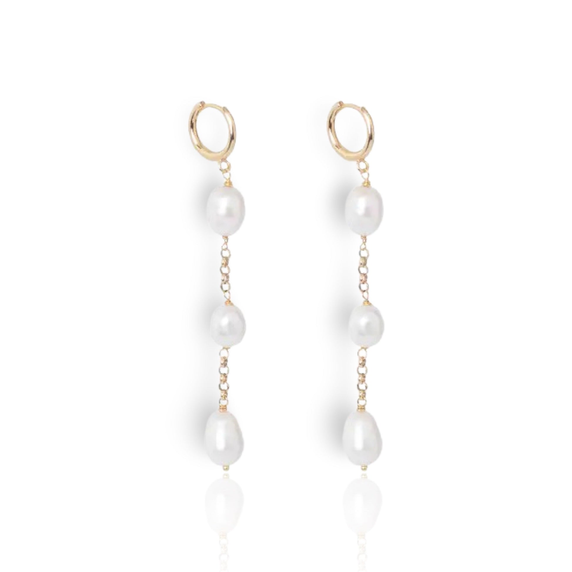Front view of Gina natural pearl gold hoop earrings