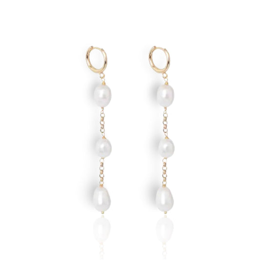 Front view of Gina natural pearl gold hoop earrings