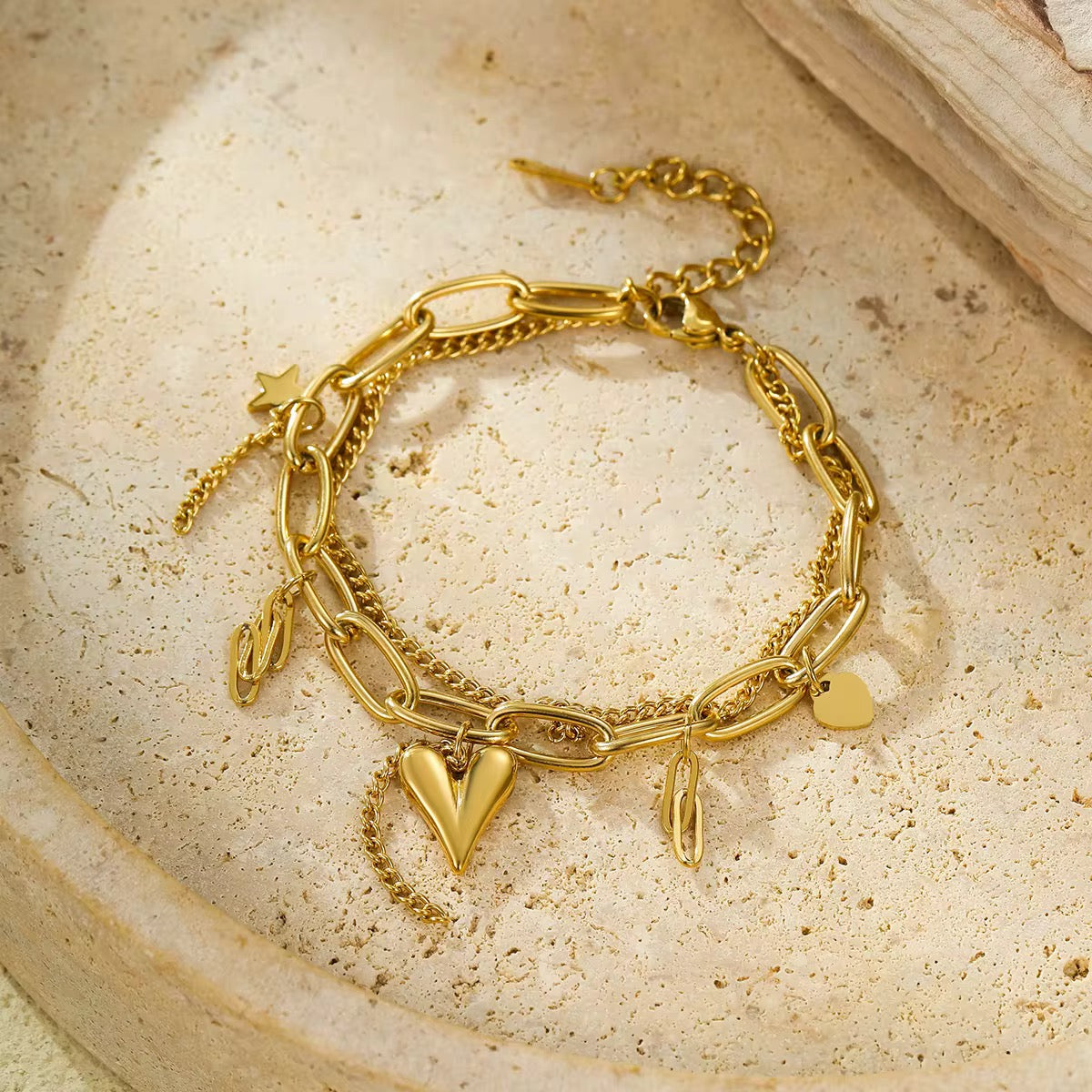 Heart charms bracelet in gold and silver options