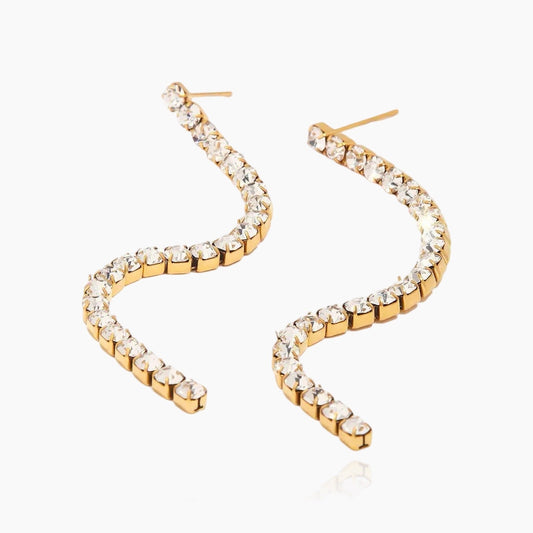 Luxe crystal fringe earrings worn on model