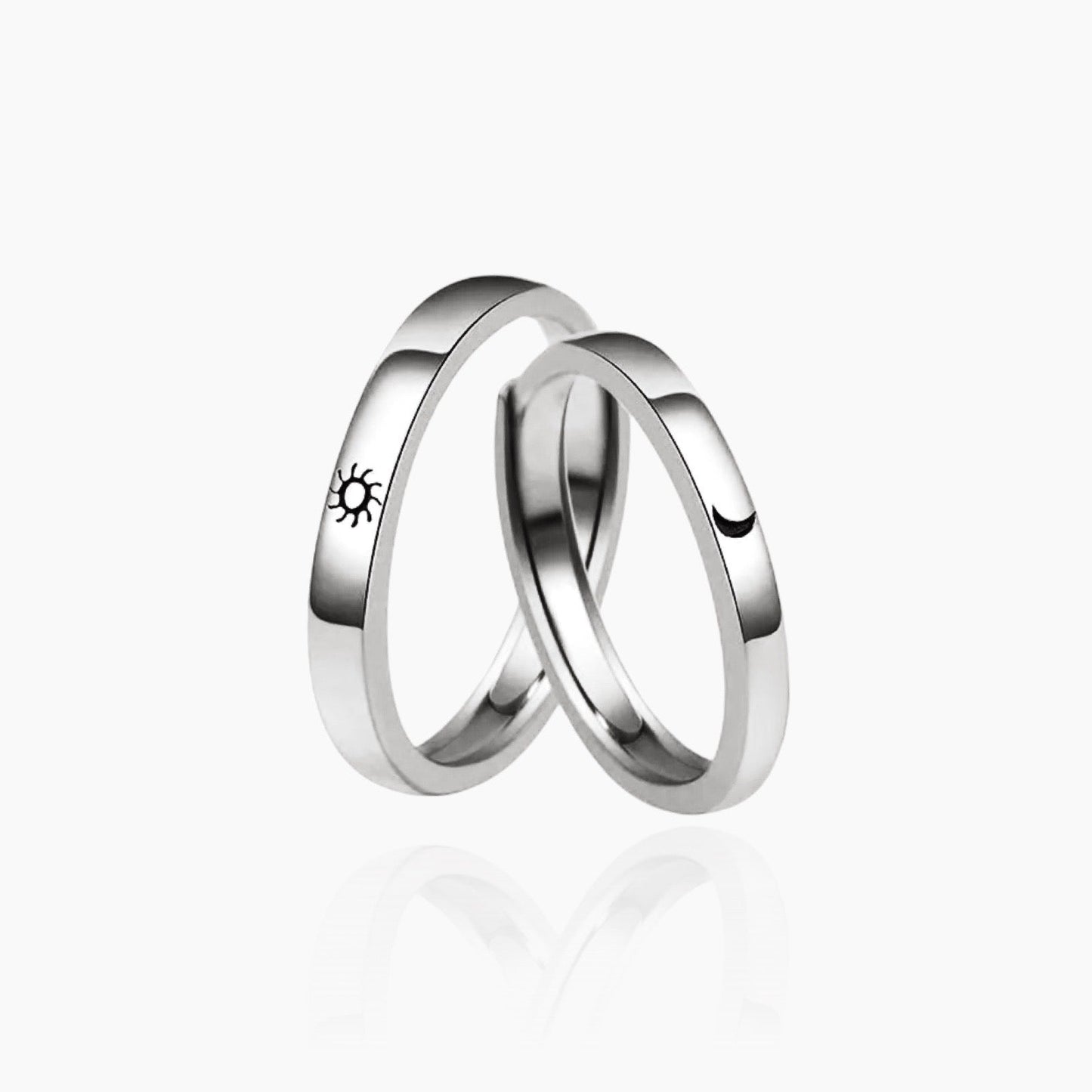 Front view of matching Moon & Sun couple rings in silver