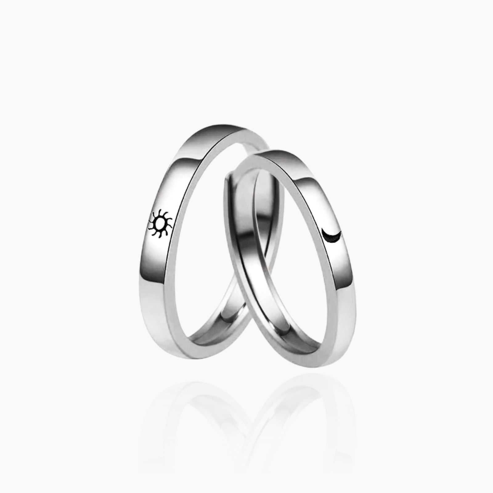 Front view of matching Moon & Sun couple rings in silver