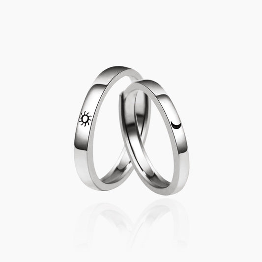 Front view of matching Moon & Sun couple rings in silver