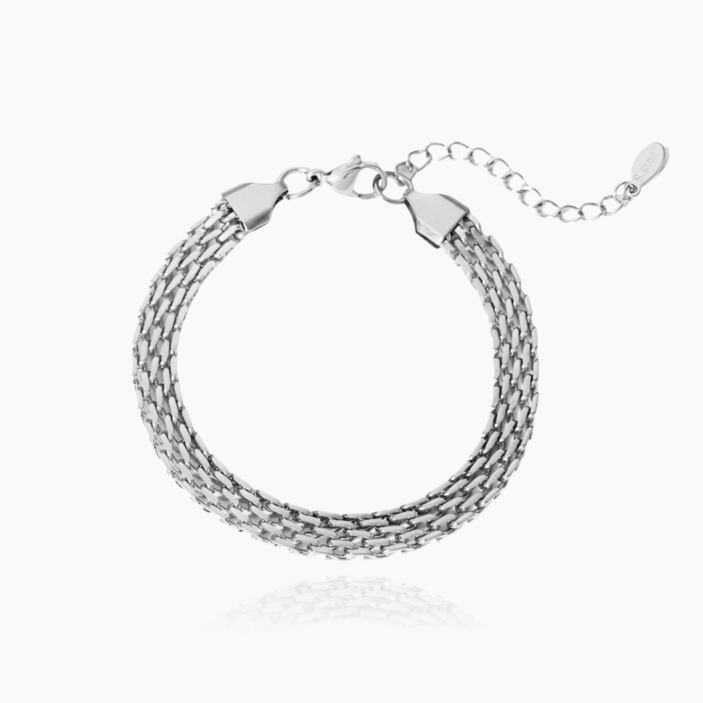 Mesh bracelet styled with other layered pieces