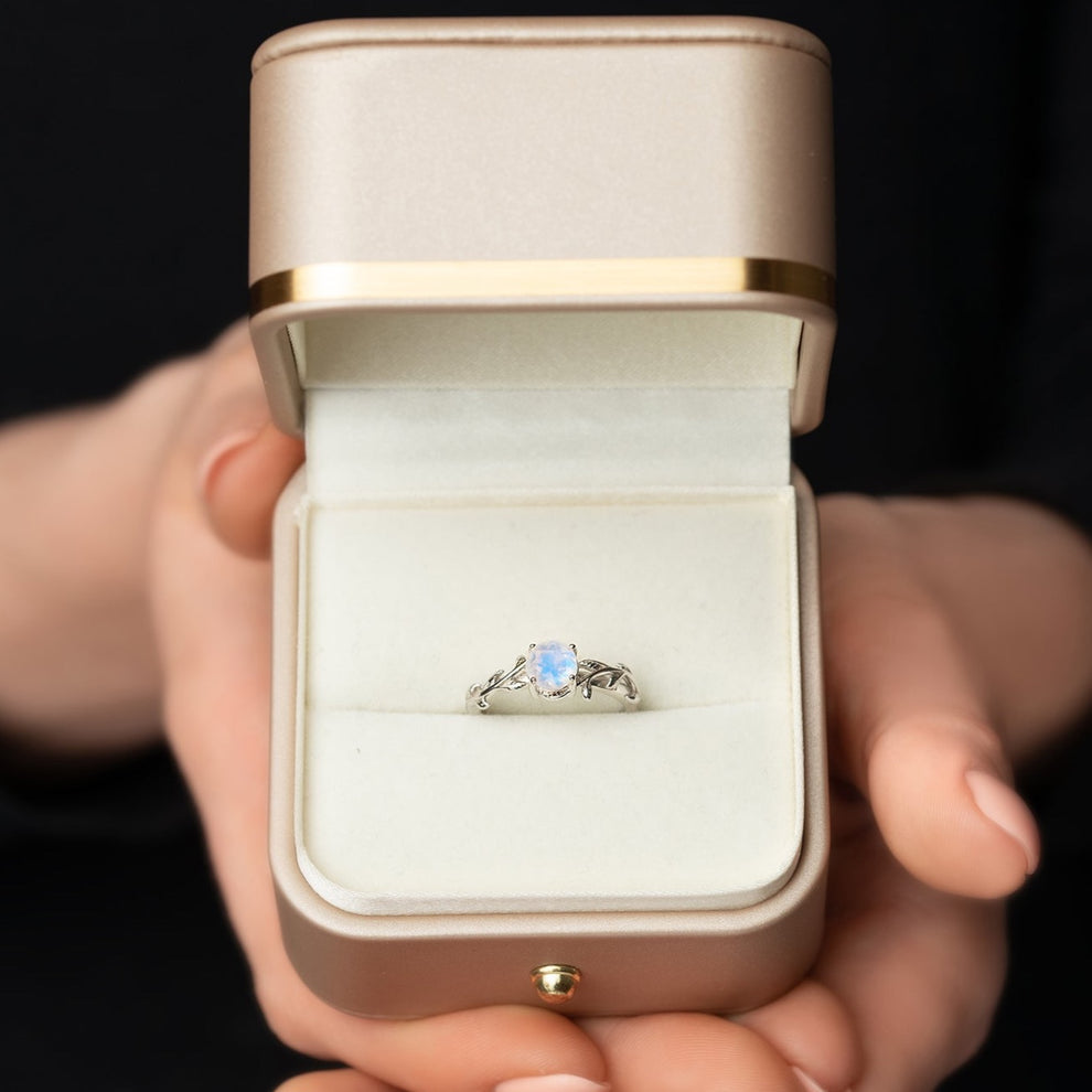 Vintage-style moonstone ring with elegant leaf detail