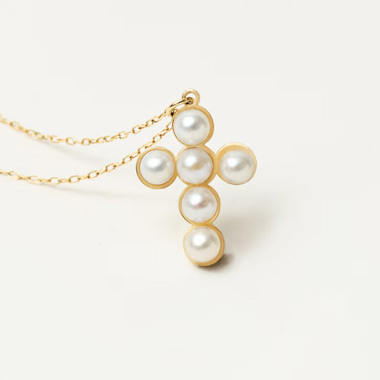 Dainty pearl cross necklace in gold plated finish
