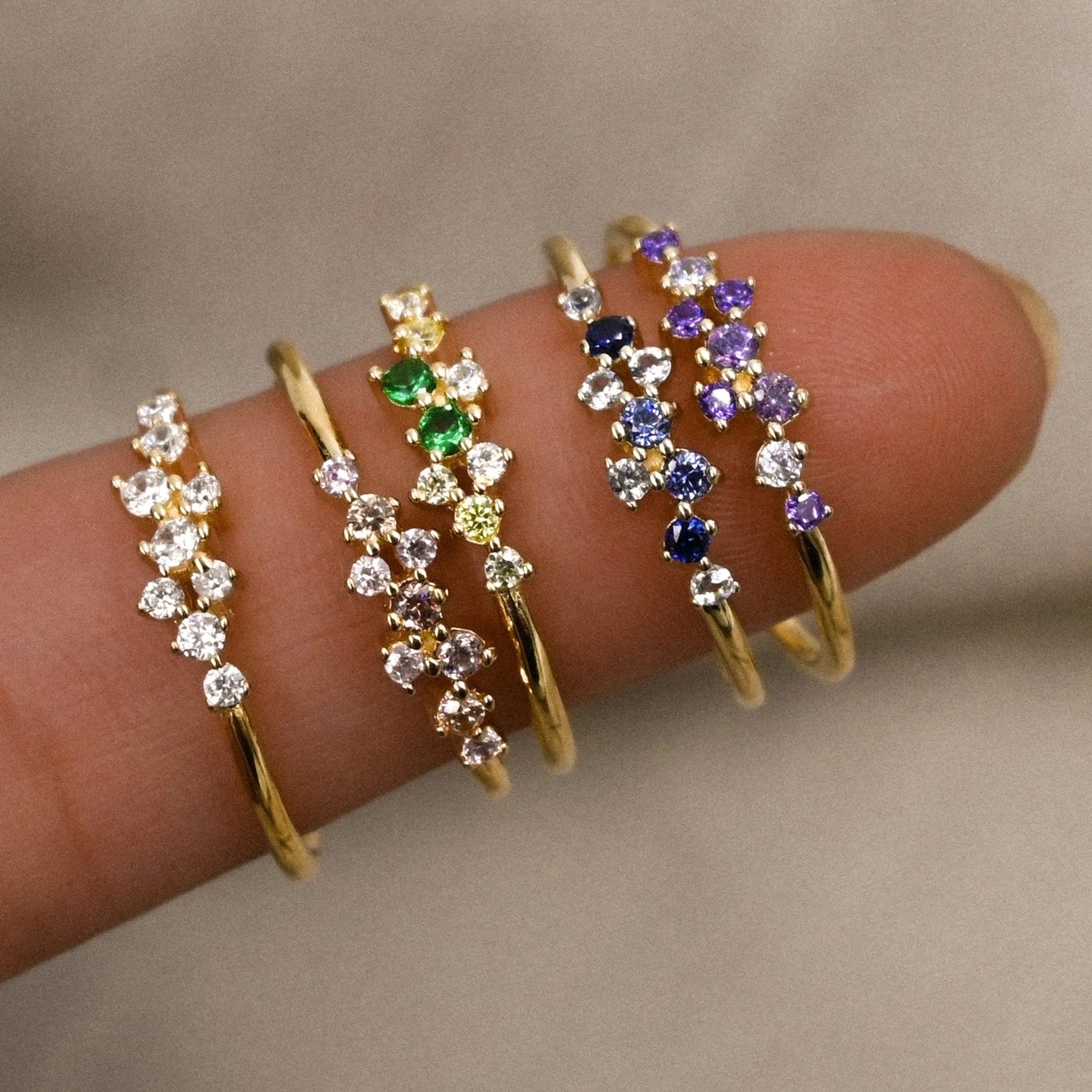 Stardust ring shown next to sizing guide (5–10)