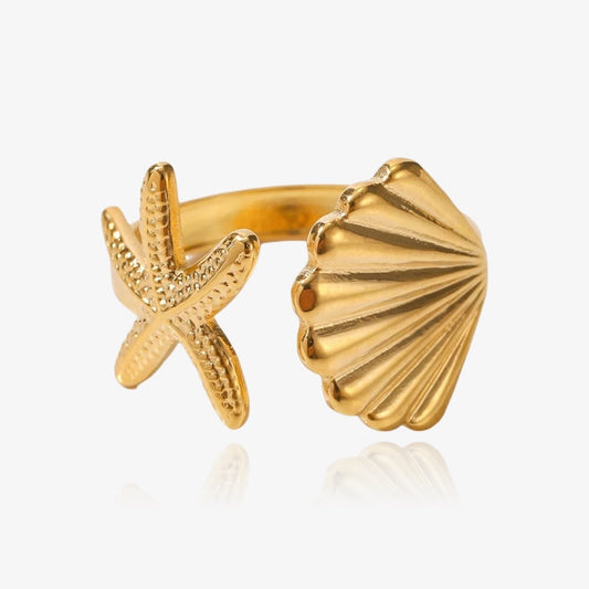 Front view of gold starfish and shell wrap ring