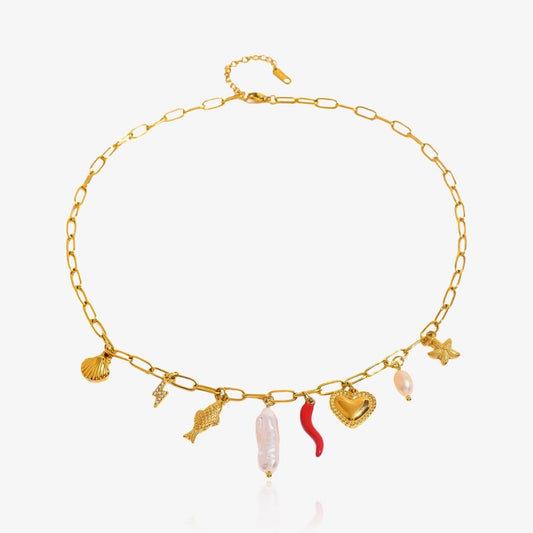 Statement necklace with playful charms and irregular pearls