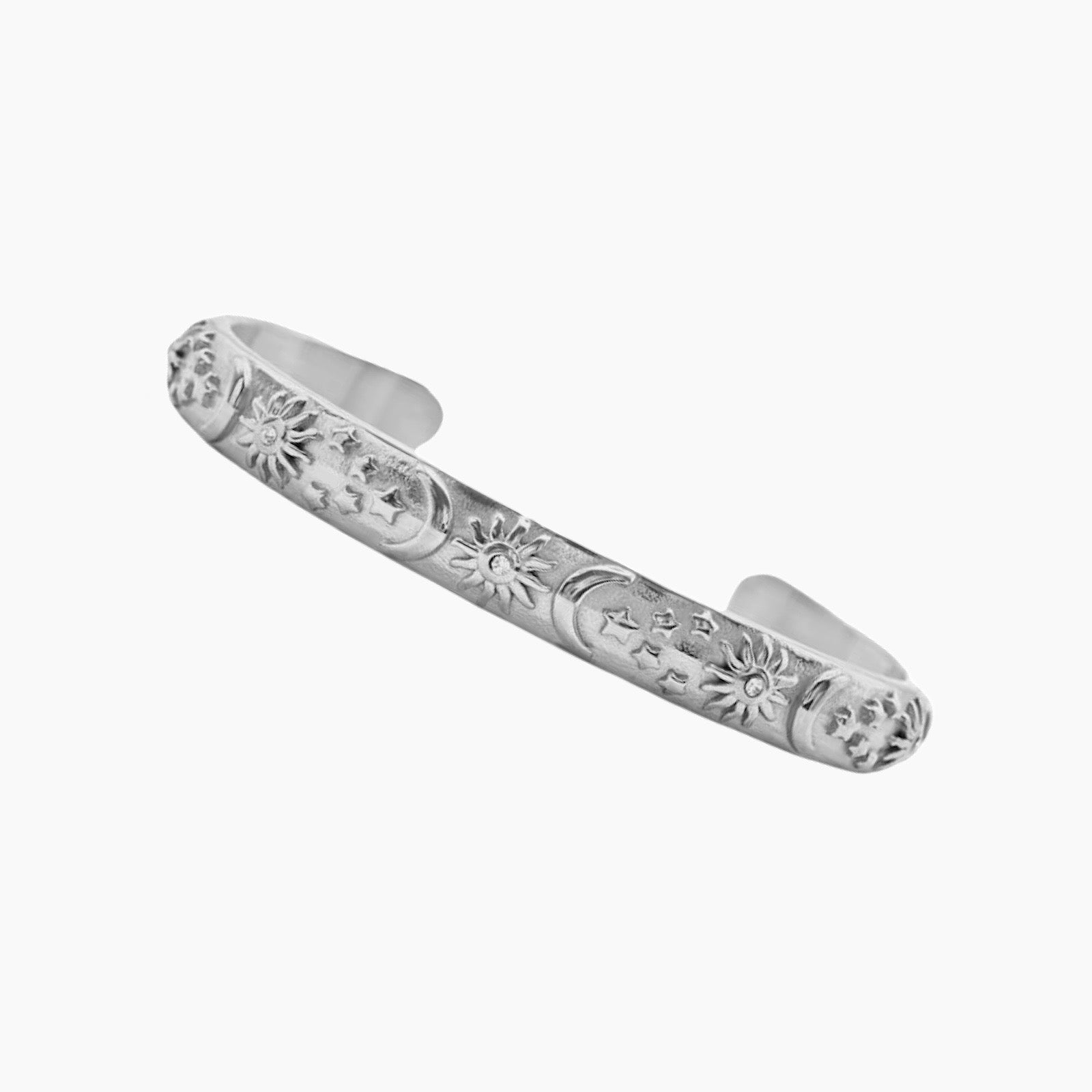 Flat lay of the sun and moon bangle bracelet