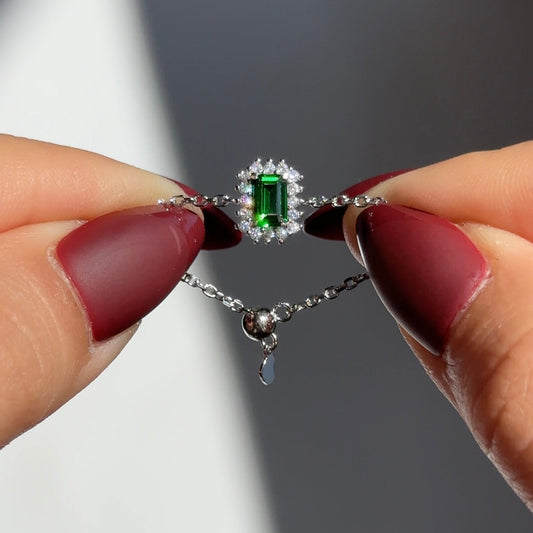 Vintage Halo adjustable chain ring with emerald or garnet stone