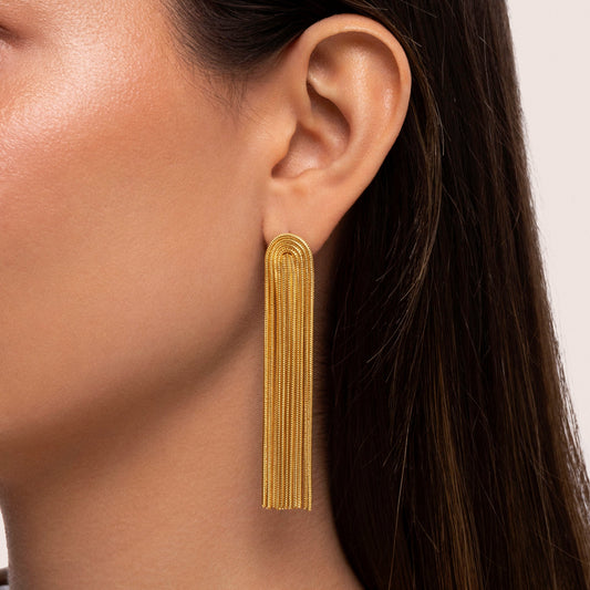 Front view of Waterfall Chic long tassel earrings in gold and silver