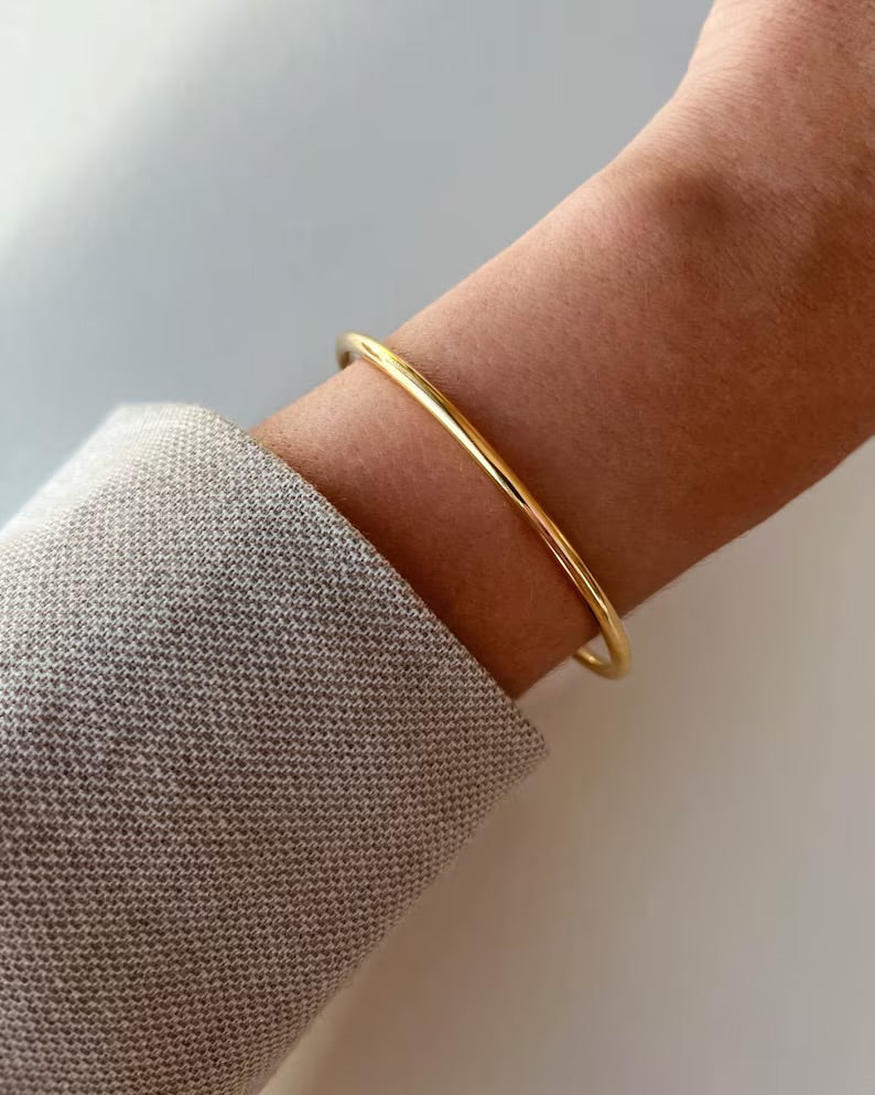 Waterproof minimalist bangle with mirror finish