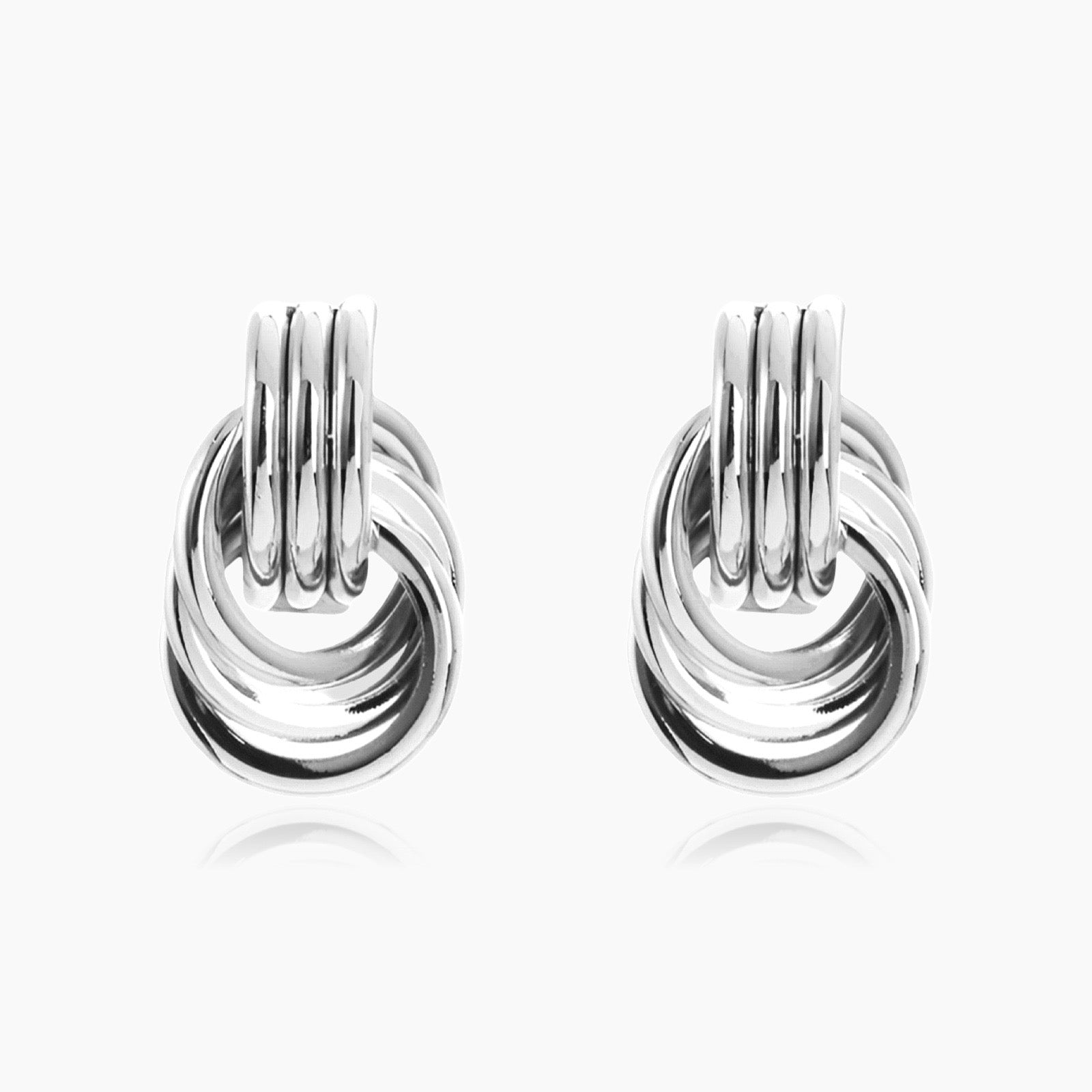 Waterproof test on gold and silver knot earrings